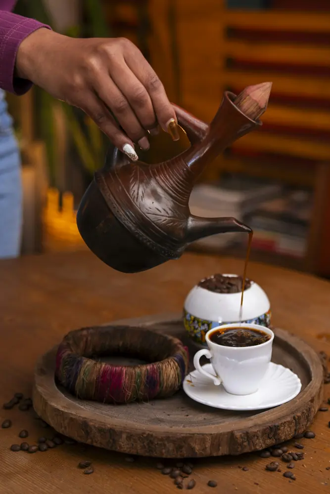 Coffee poured from a traditional jebena (stock photo, not taken at Habesha)